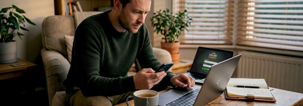 Man entering 2FA code for casino login