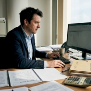 Compliance officer reviewing casino audit reports