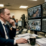 Casino security manager monitoring screens