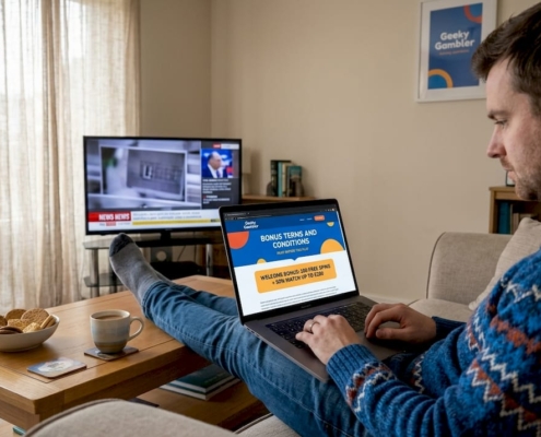 Man checking casino bonus terms at home