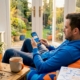Man using free spins on smartphone at home